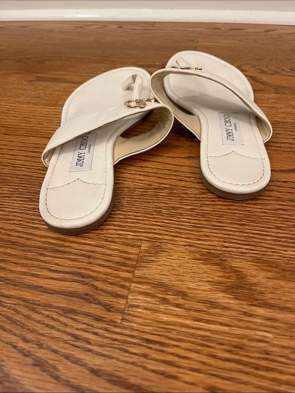 Jimmy Choo JC Monogram Flat Leather Thong Sandals in white/milk leather